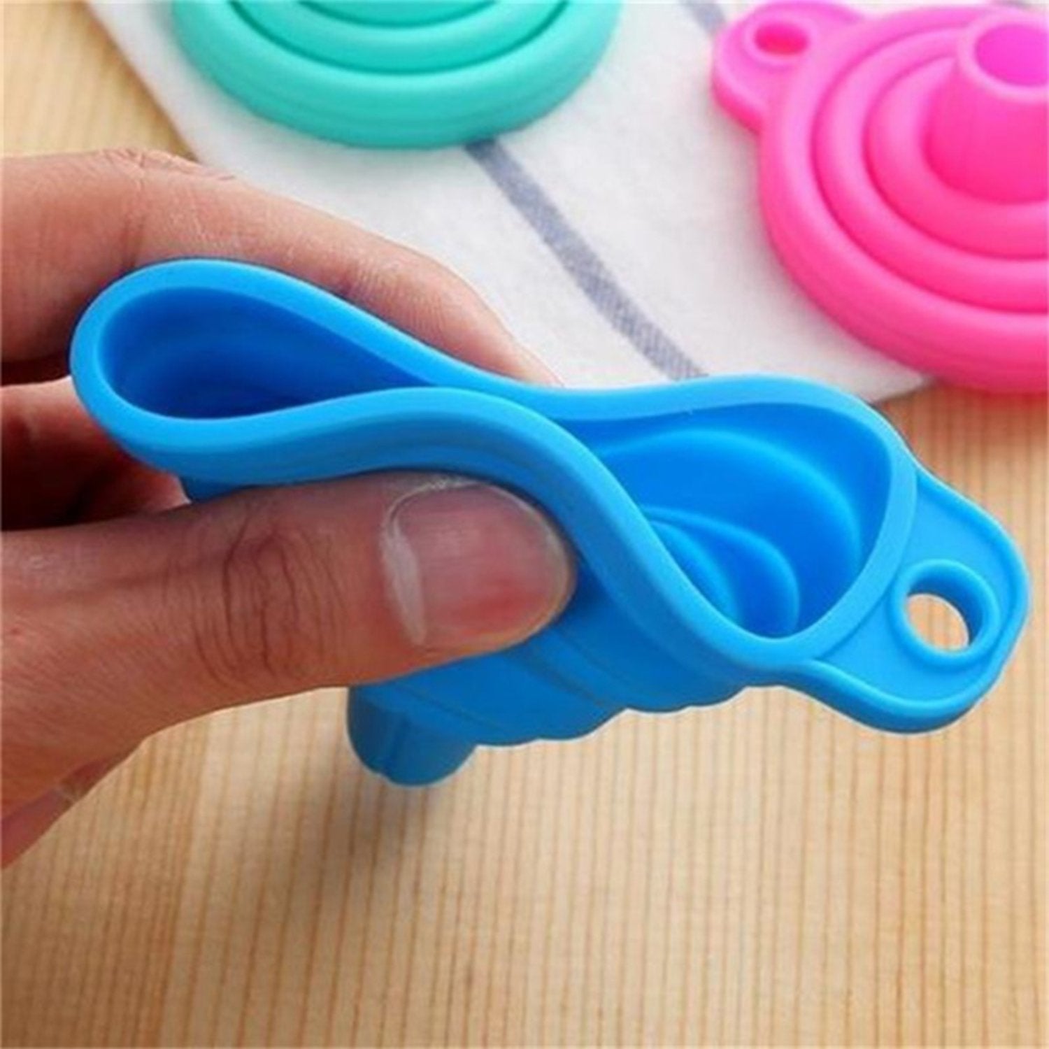 Multi-use silicone funnel for sauces and liquids. Multi-use silicone funnel for sauces and liquids.